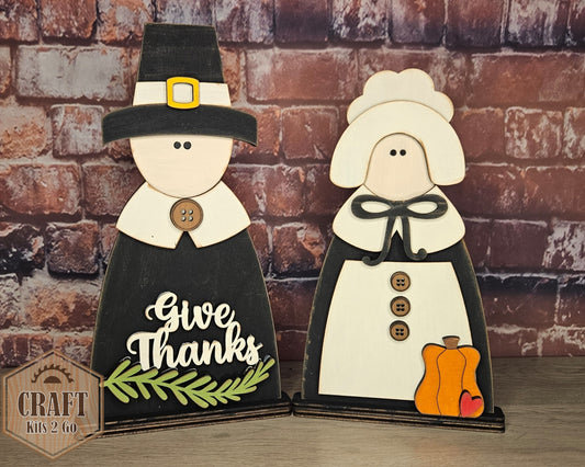 **SHOW OVERSTOCK SALE** Pilgrim Couple Shelf Sitter | #4473 & 4474